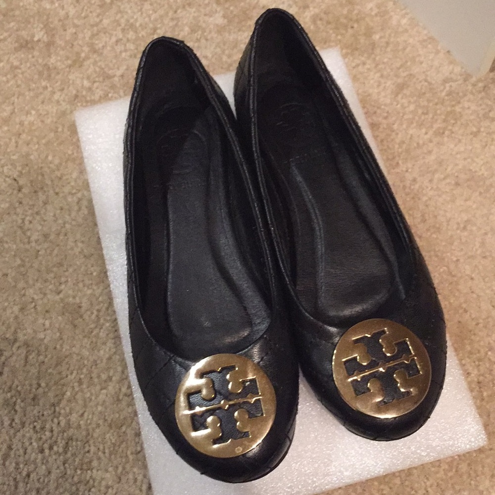 Black flat with gold decor